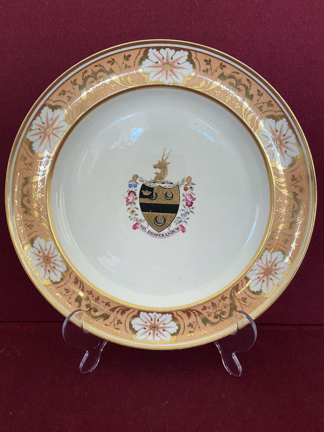 A Chamberlain Worcester armorial dinner plate c.1816-1820