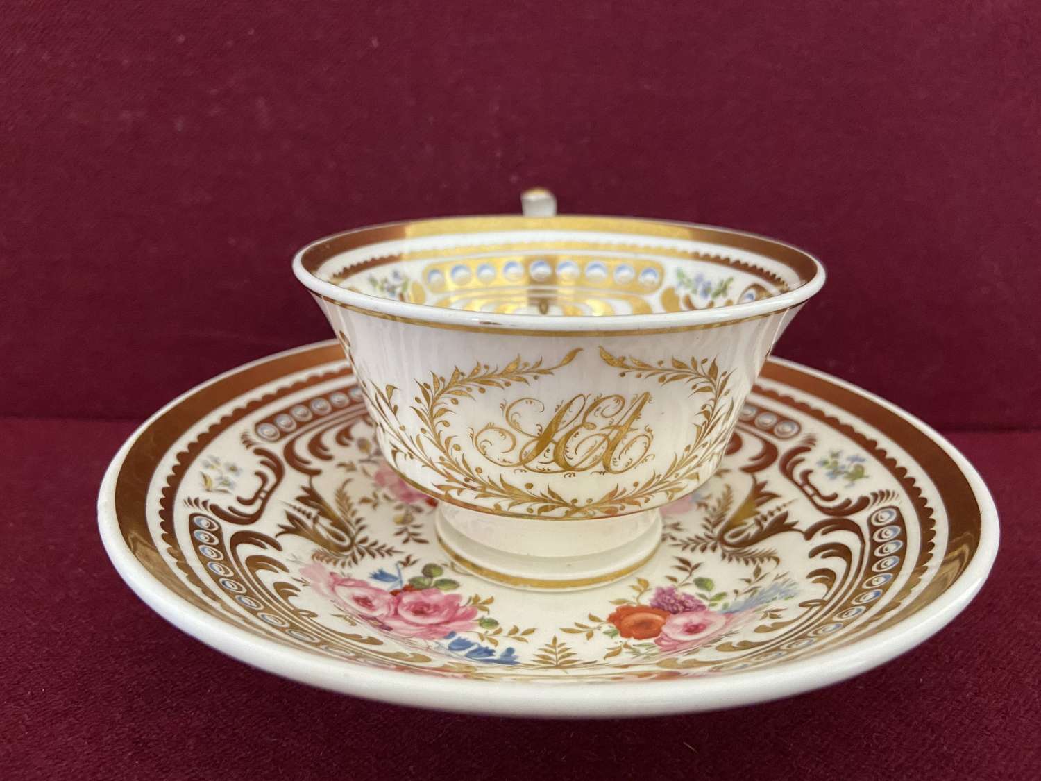 A Coalport porcelain teacup and saucer of 'London' shape c.1815