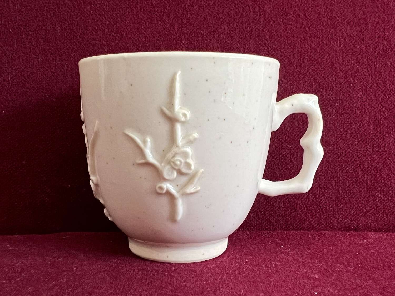 A Bow porcelain Blanc De Chine Coffee Cup c.1756-65