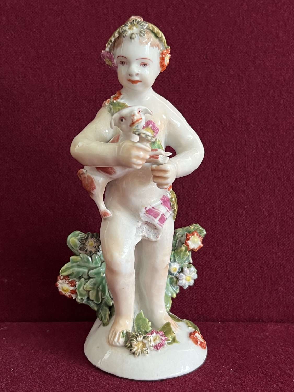 An early Derby Porcelain figure of a Putto c.1760