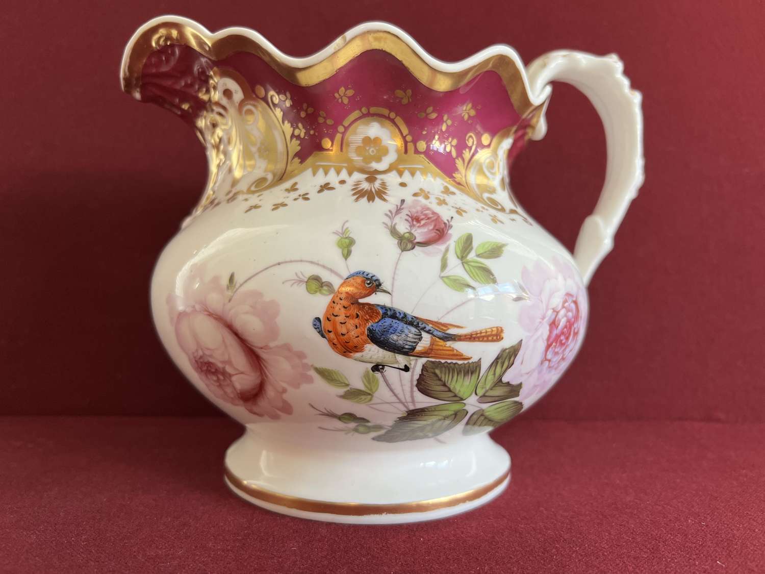 A finely decorated porcelain jug by Samuel Alcock c.1830