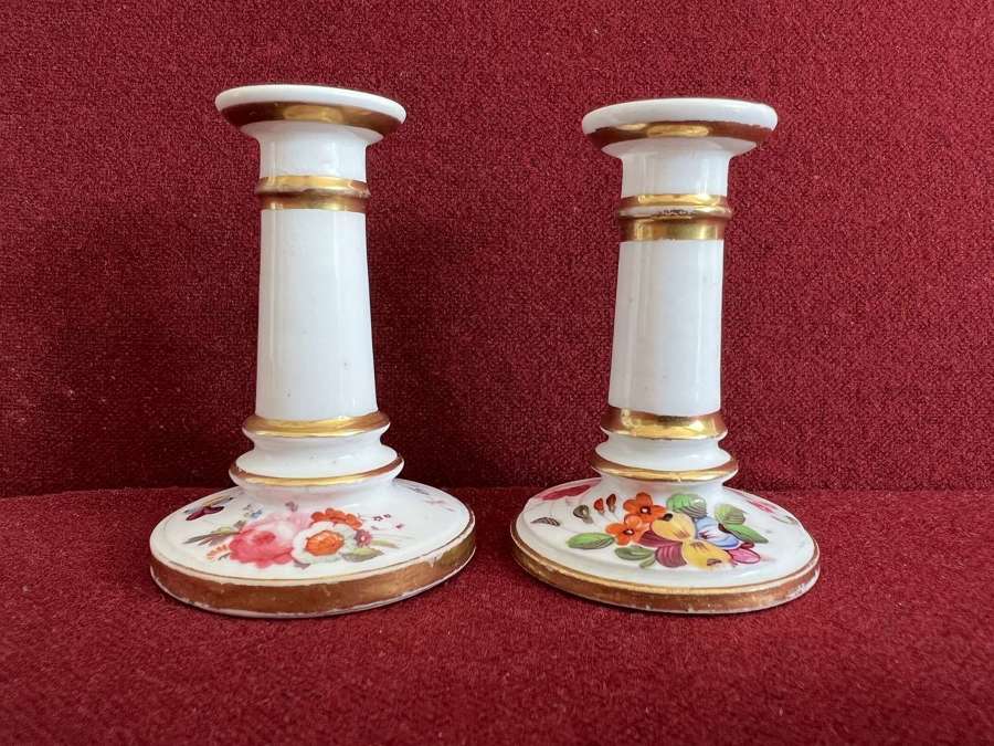 A pair of miniature Coalport porcelain candlesticks c.1825