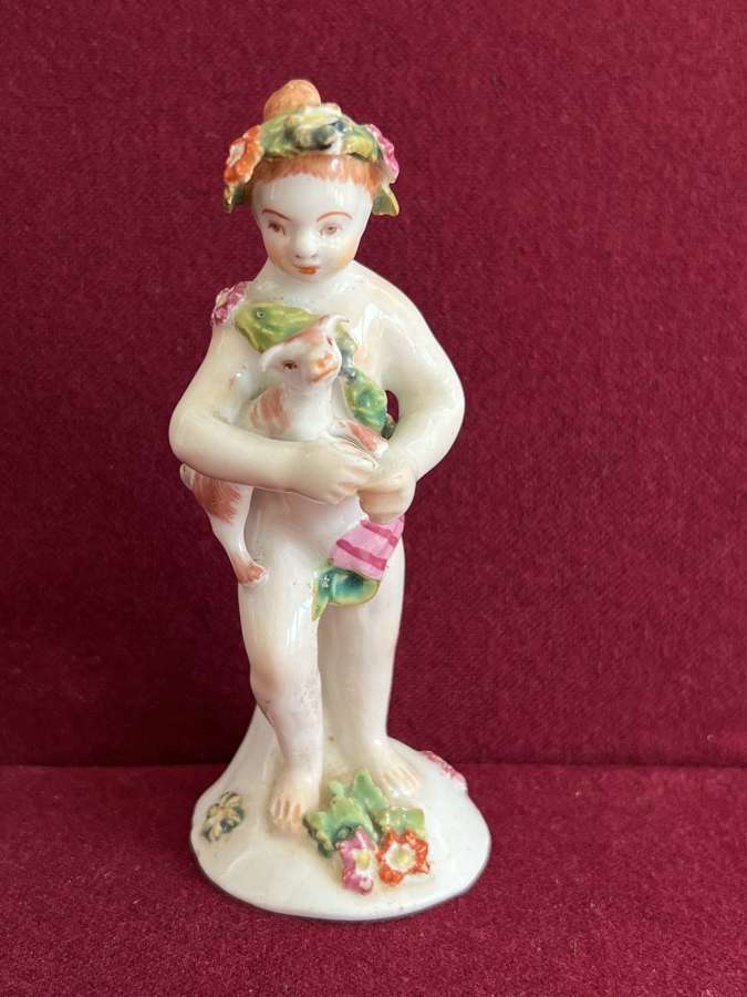 An early Derby Porcelain figure of a Putto c.1760