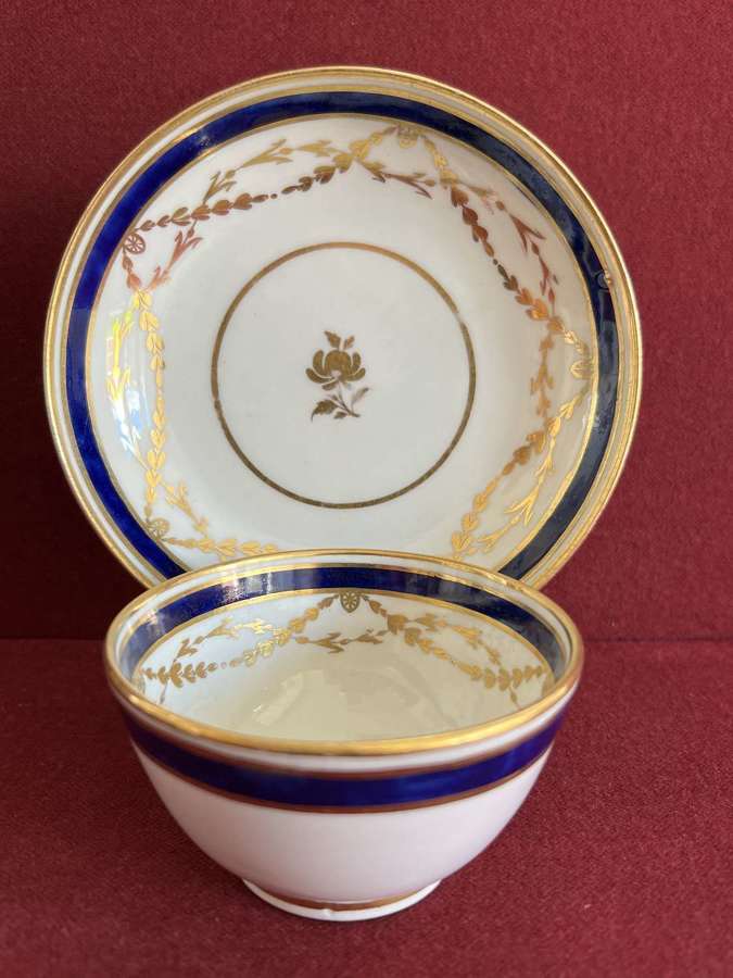 A rare early New Hall Porcelain Tea-bowl and Saucer c.1785 -1790