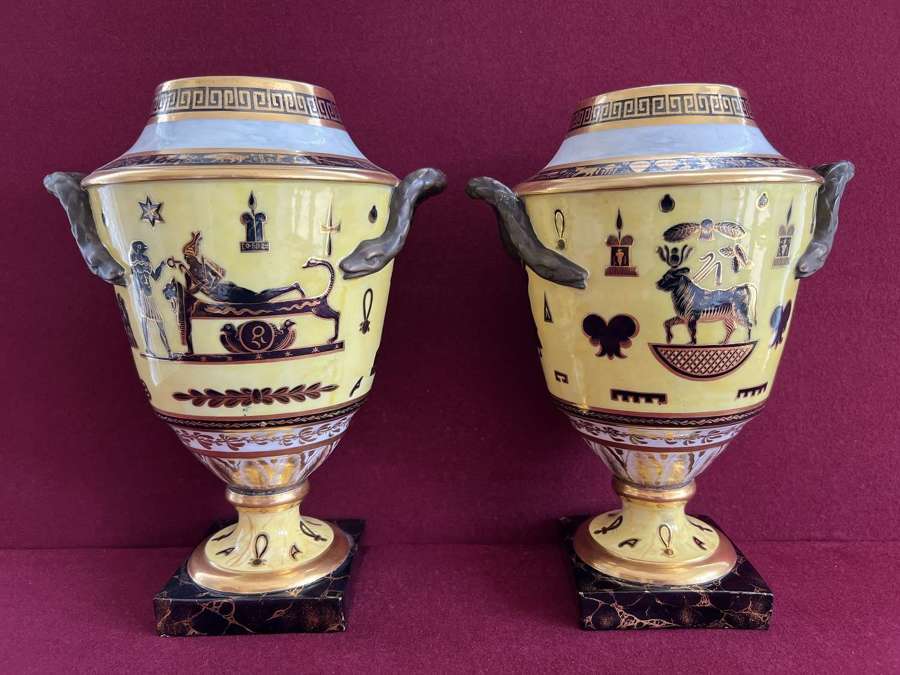 A rare pair of Derby yellow ground Egyptian revival vases c.1805-1810