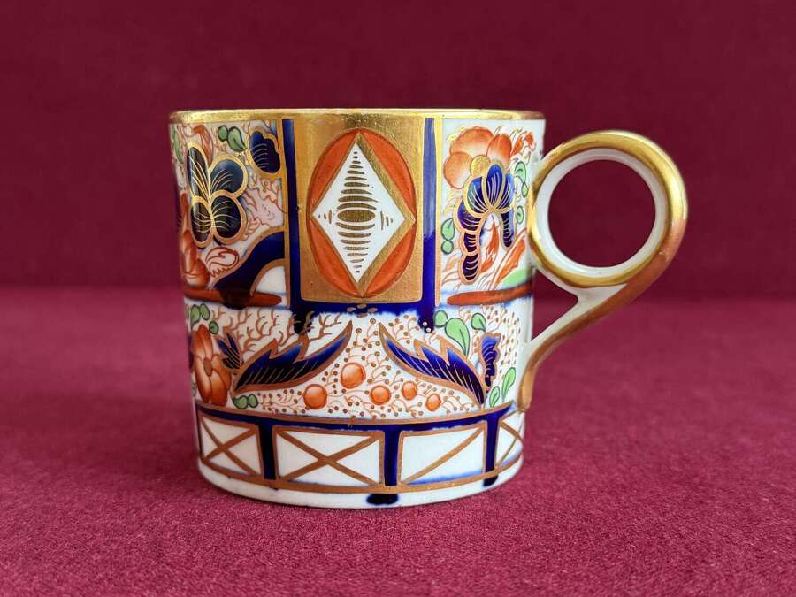 A Grainger's Worcester Porcelain Coffee Can from a 'New Oval' Shape Service in pattern 140