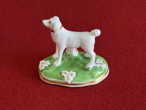 A small Chamberlain Worcester Porcelain model of a dog c.1847 - 1852